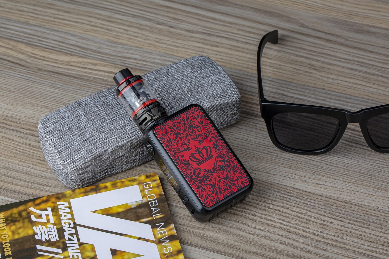 Assorted vape accessories including drip tips, cables and cases